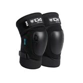 TSG youth mountain biking knee guard with protective padding and adjustable straps for knee safety during outdoor riding.