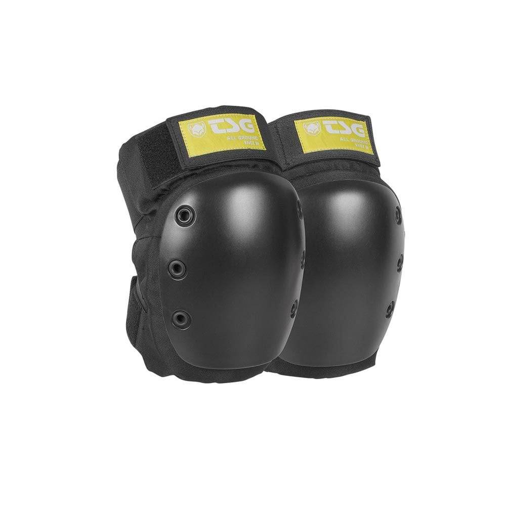 TSG All Ground knee protection pads with adjustable fit, designed for sports and work, shown on a person in action.