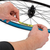 Halo Evaura Disc Rim Decals Kit with customizable protective wheel stickers on a car wheel rim.