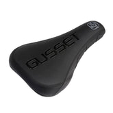 Gusset Components S2 DJ saddle with pivotal stealth fit and anti-slide grip, featuring sleek design and durable construction.