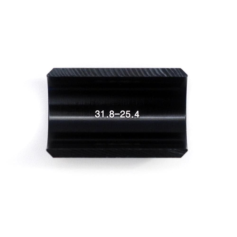 Redshift Sports handlebar shims for 25.4mm and 26.0mm to 31.8mm stem clamp adapter on a bike component