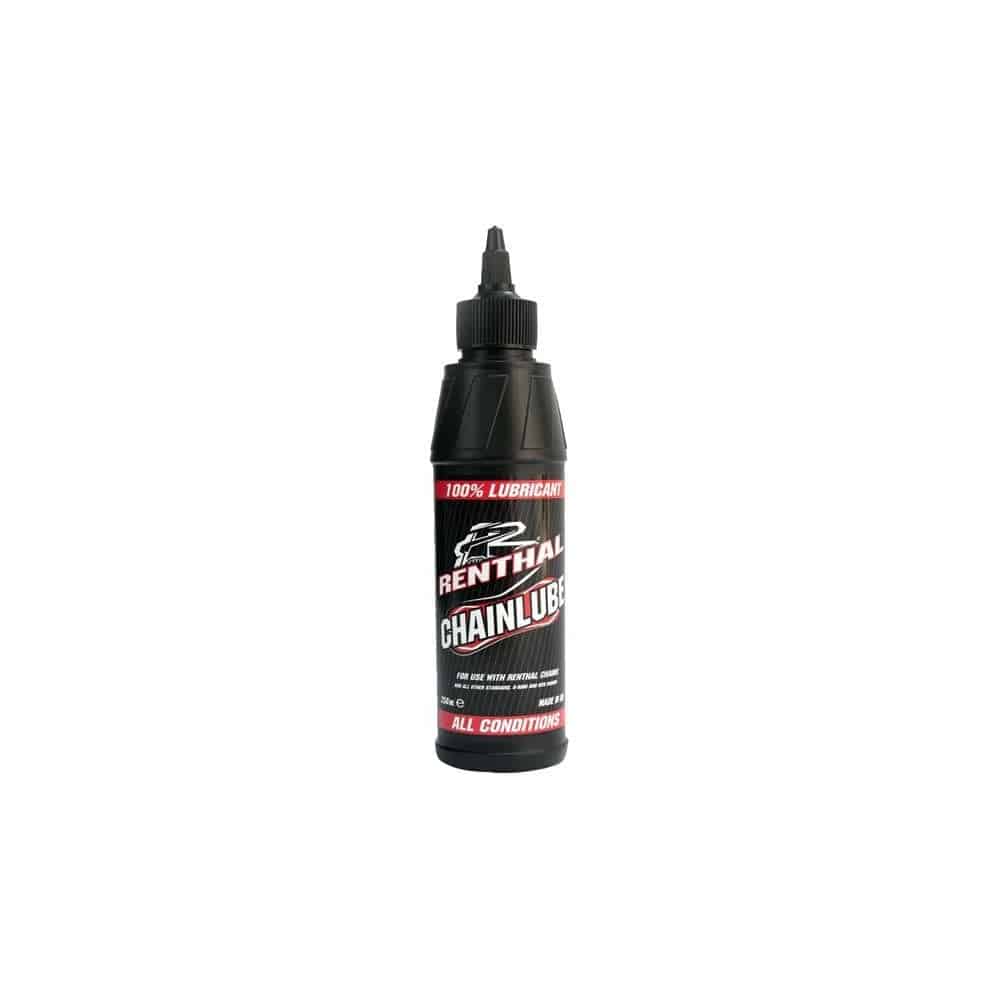 Rohloff synthetic biodegradable chain lube for Lubmatic system, shown in workshop setting with applicator bottle and tools.