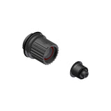 DT Swiss Micro Spline 12-Speed pawl freehub conversion kit for 135mm quick-release bikes, showing the components and threading.