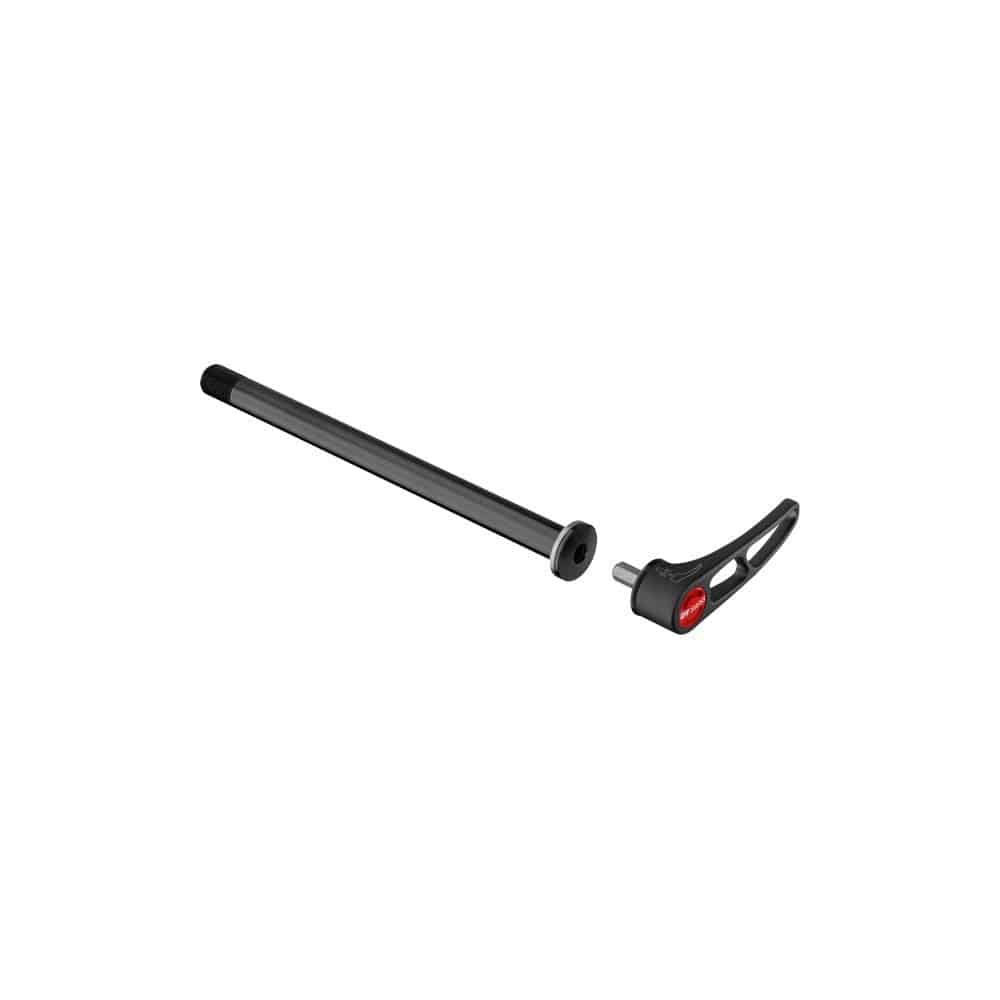 DT Swiss RWS Plug In MTB rear thru axle 12x142mm with 12x1.5mm thread, shown in workshop setting for mountain bike maintenance.