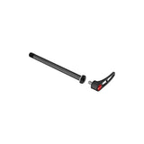 DT Swiss RWS Plug In MTB rear thru axle 12x142mm with 12x1.5mm thread, shown in workshop setting for mountain bike maintenance.