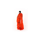 Lifesystems waterproof survival bag used as emergency shelter and heat retention gear, made of reflective, durable material.