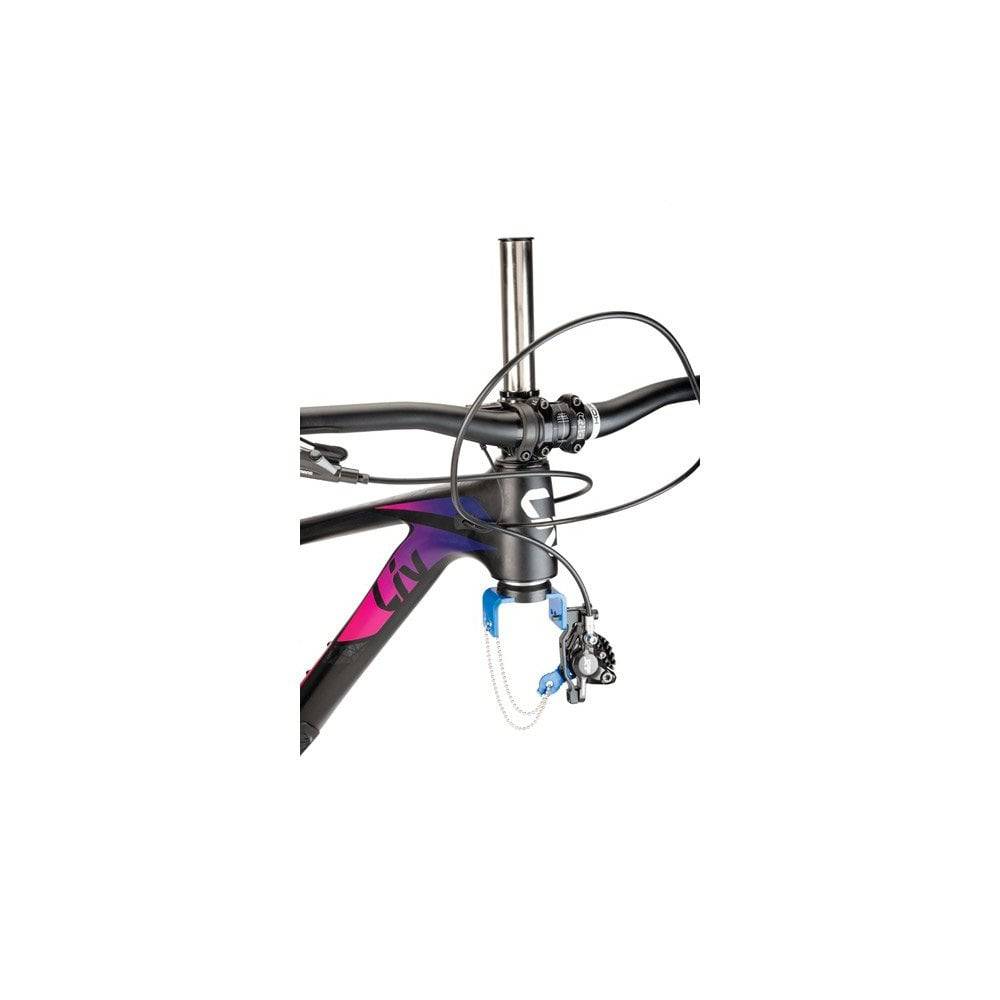 Park Tool DF-1 dummy fork for bike maintenance with brake caliper holder and spacer, used in workshop bike repair setups.