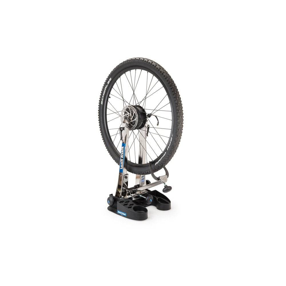 Park Tool TS-2EXT.3 upright extensions and thru-axle adapters for TS-2 truing stand, used in bicycle wheel truing workshops.