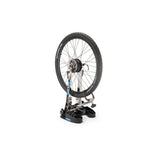 Park Tool TS-2EXT.3 upright extensions and thru-axle adapters for TS-2 truing stand, used in bicycle wheel truing workshops.