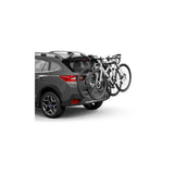 Thule OutWay rear-mount 2 bike carrier rack with anti-sway and locking cable, designed for secure vehicle bike transport.