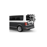 Thule WanderWay rear-mount 2-bike carrier attached to a Volkswagen T6 van, showing its sturdy design and mounting system.