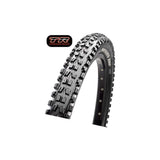 Maxxis Minion DHF EXO/TR tubeless ready mountain bike tyre with aggressive tread for trail riding, shown mounted on a bike wheel.