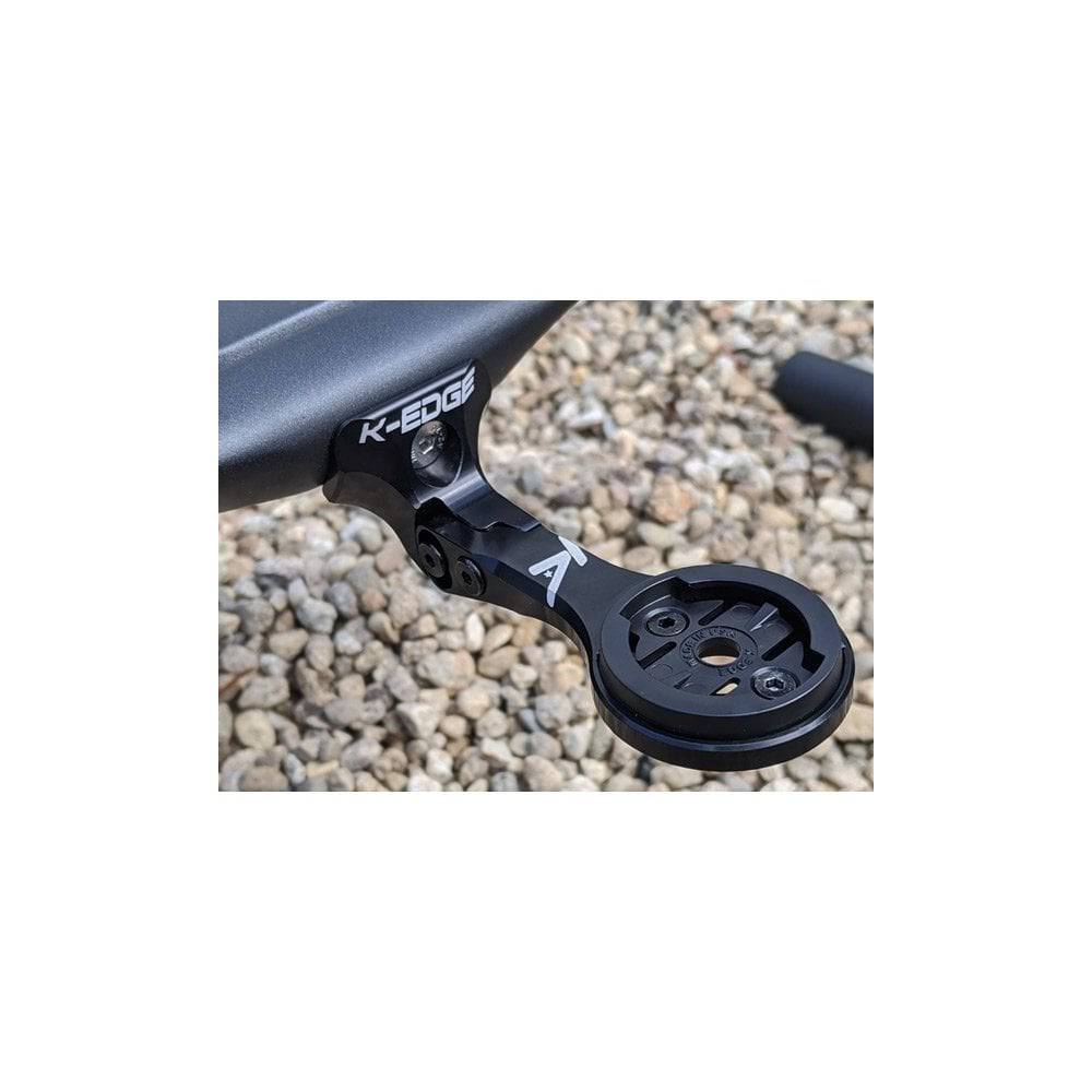 K-Edge Garmin mount attached to Trek Madone and Emonda Gen 6 integrated bar stem in black, designed for cycling components.