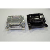 Thomson oversized saddle rail clamps in black, compatible with bike seatposts, shown as spare components for bicycle saddle adjustments.