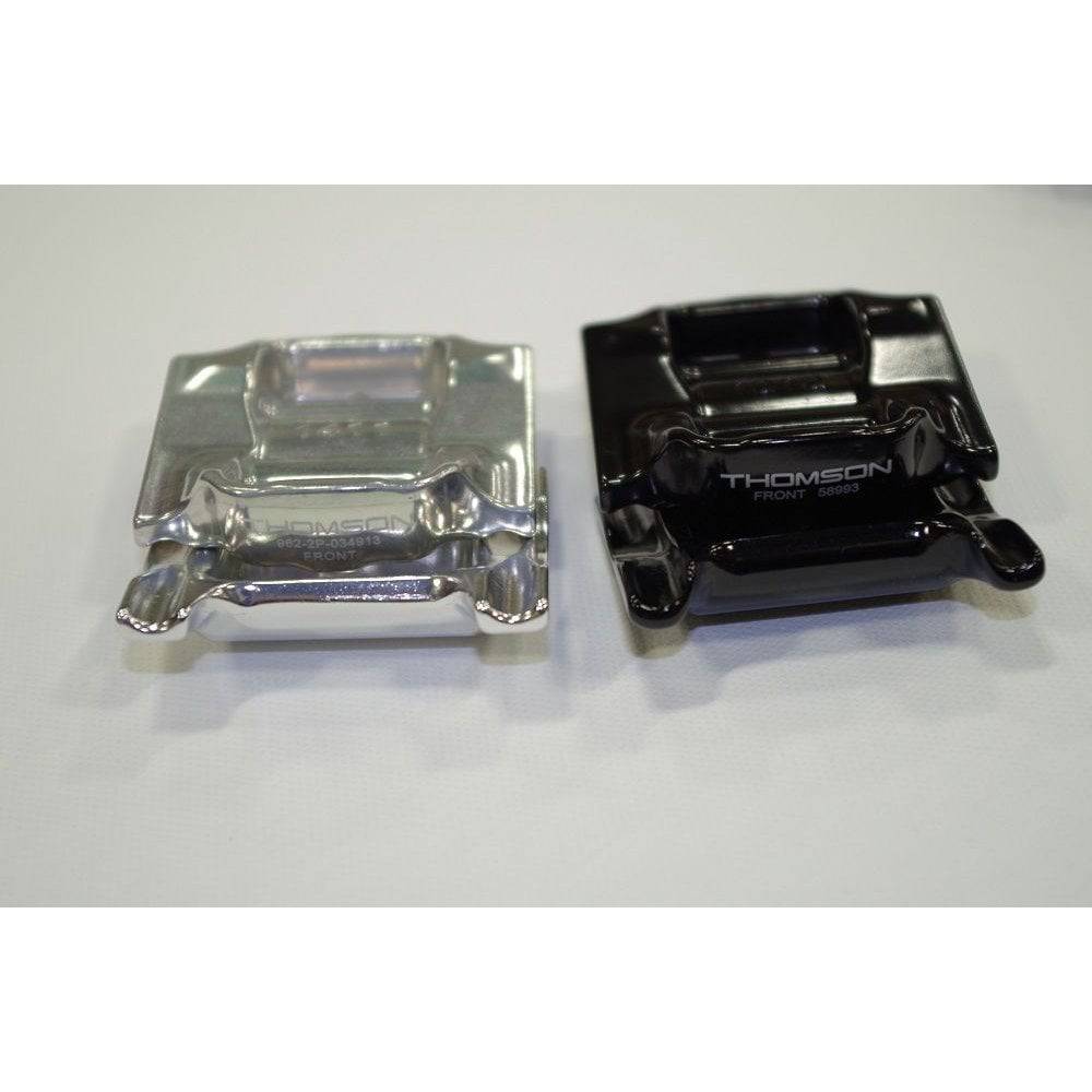 Thomson Silver Standard Saddle Rail Clamps for durable seatpost support, shown in a close-up view of the component.