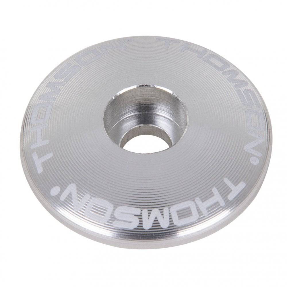 Silver Thomson 1 1/8 bike stem cap for securing bike stems and seatposts, shown on a white background.