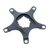 Praxis Works Direct Mount Spider 110 BCD spare part for crankset upgrade, showing the black metal component with bolt holes.