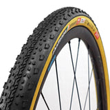 Challenge GETAWAY-PRO-H gravel tire 700x40 tan tubeless ready with 260 TPI, close-up of textured rubber tread and sidewall.