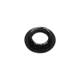 Trek black M16 x 6mm main pivot axle nut for full-suspension bike components, shown on a bicycle part.