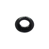Trek black M16 x 6mm main pivot axle nut for full-suspension bike components, shown on a bicycle part.