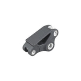 Trek Powerfly FS 2021 upper rocker links for suspension components, close-up of spare frame parts for mountain bike.
