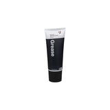 Bontrager bicycle grease lubricant in a workshop setting, waterproof, low friction, and compatible with carbon fiber bike components.