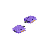 Trek Kids' large platform flat pedals with 9/16-inch axles in ultraviolet color, designed for kids' bikes.