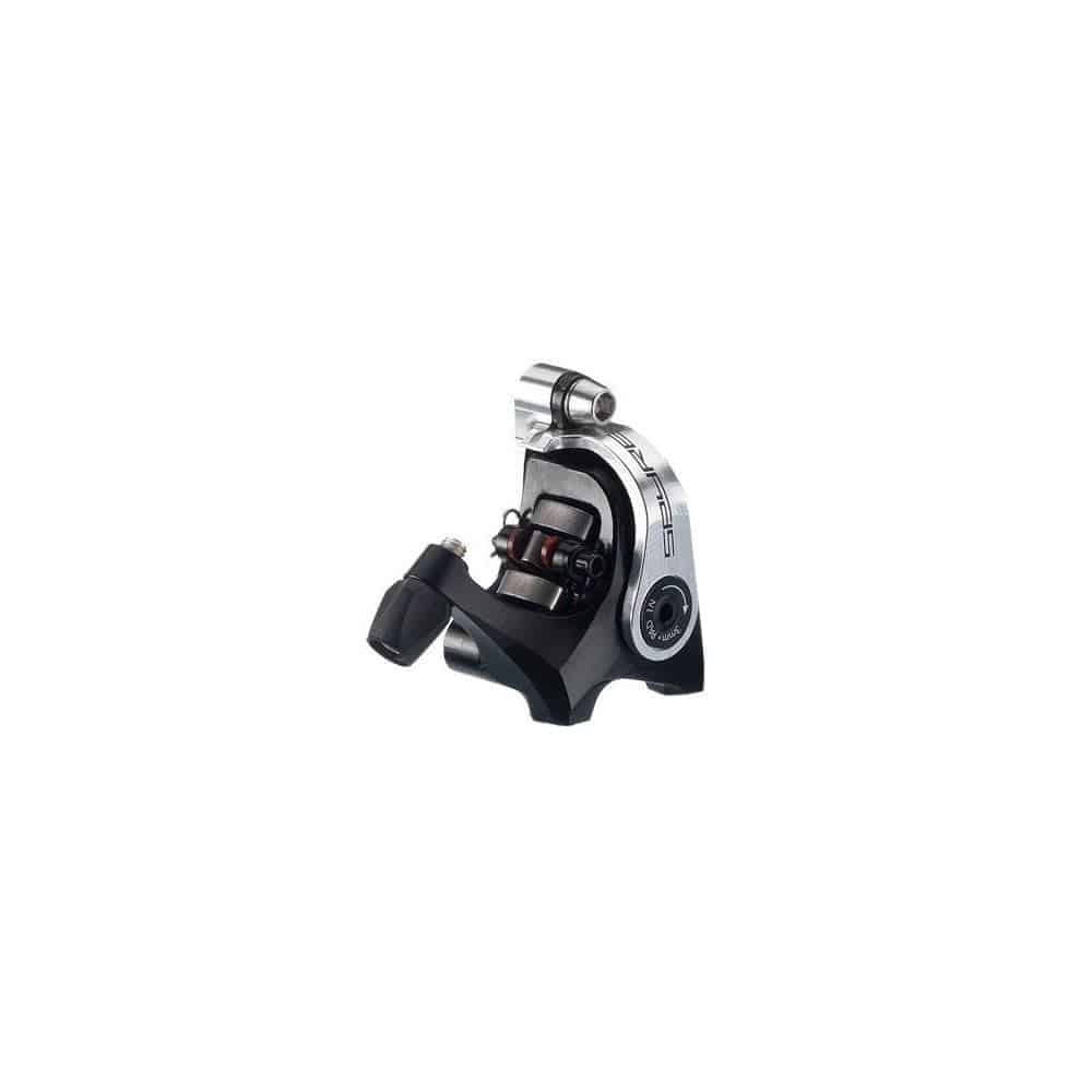 TRP Spyre flat mount mechanical disc brake caliper with dual-sided actuation, shown mounted on bicycle wheel.