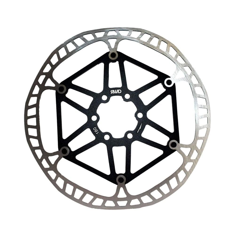 Kinesis UK Centrelock disc brake adaptor with QR and 12mm upgrade for bike components, shown on a bike wheel.