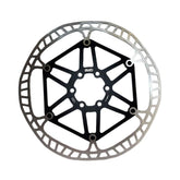 Kinesis UK Centrelock disc adaptor for QR and 12mm thru-axle, bike brake component upgrade, shown on a bicycle wheel.