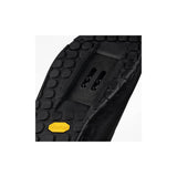 Fizik Gravita Versor MTB shoes with Vibram Megagrip outsole, designed for trail riding, featuring rugged black and blue clip-in cycling footwear.