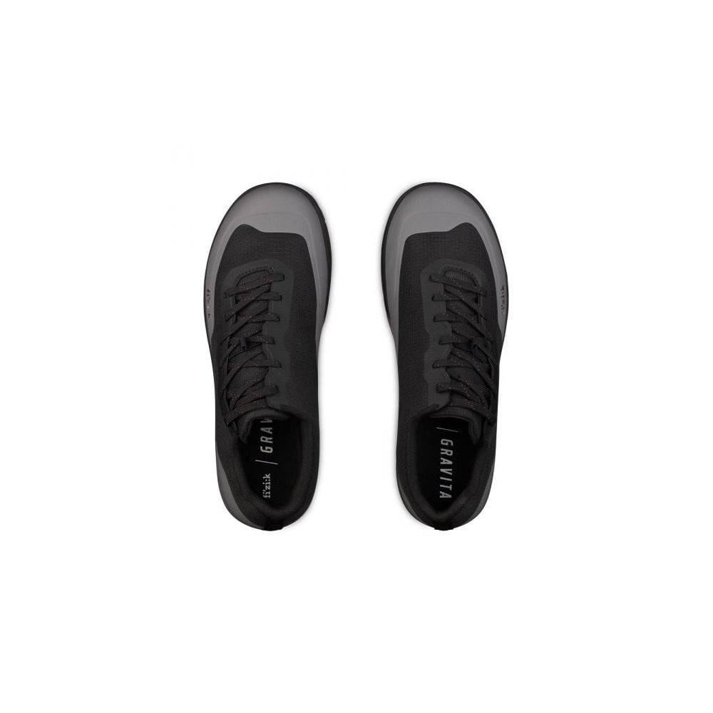 Fizik Gravita Versor MTB clip shoes with Vibram Megagrip outsole, designed for trail riding and mountain biking.