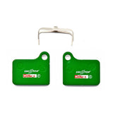 SwissStop Disc 5 Organic brake pads for Shimano Deore BR-M555, pair of green components for bicycle disc brakes.