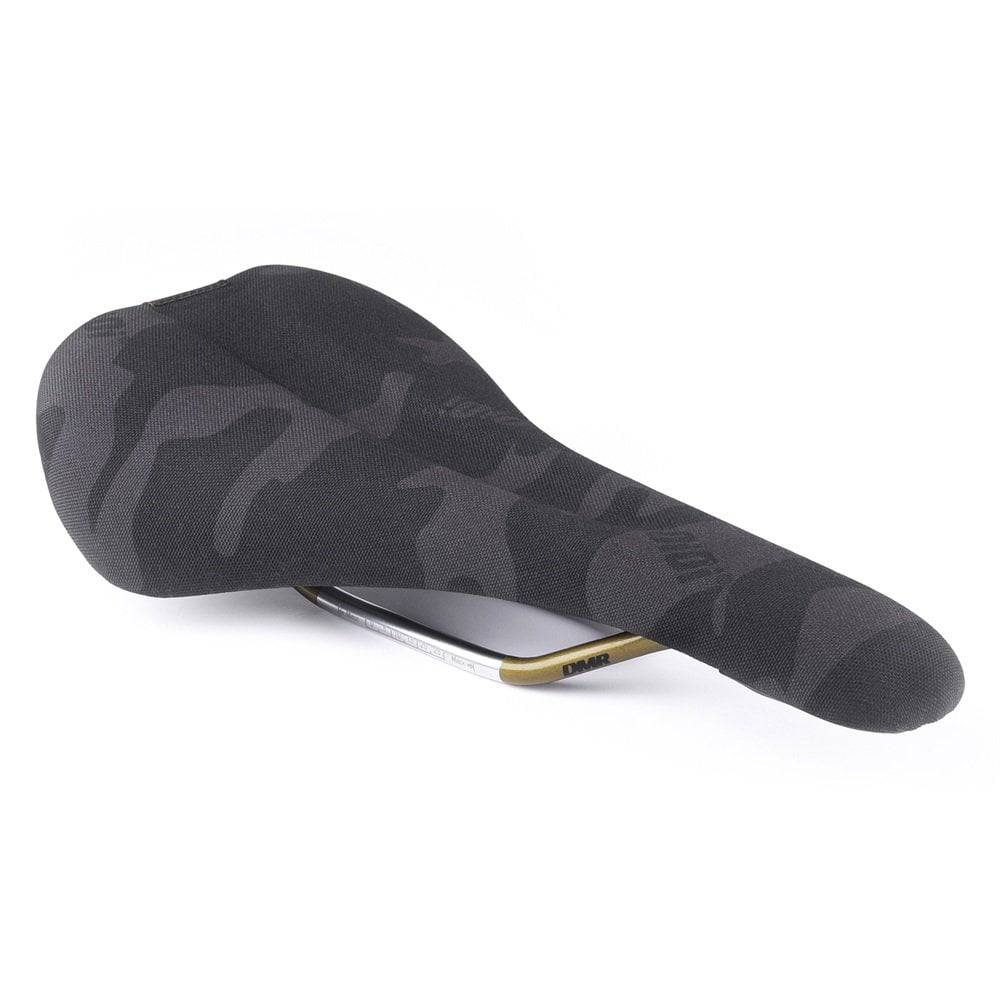 DMR Bikes OiOi Camo saddle for mountain and trail bikes, durable bike seat with camouflage design, suitable for off-road cycling.