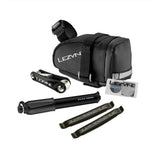 Lezyne M Caddy Sport bike repair kit with compact multi-tool and mini pump, designed for on-the-go cycling maintenance accessories.