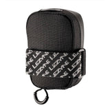 Lezyne Road Caddy compact saddle bag with water-resistant zipper and reflective details, designed for cycling accessories storage.