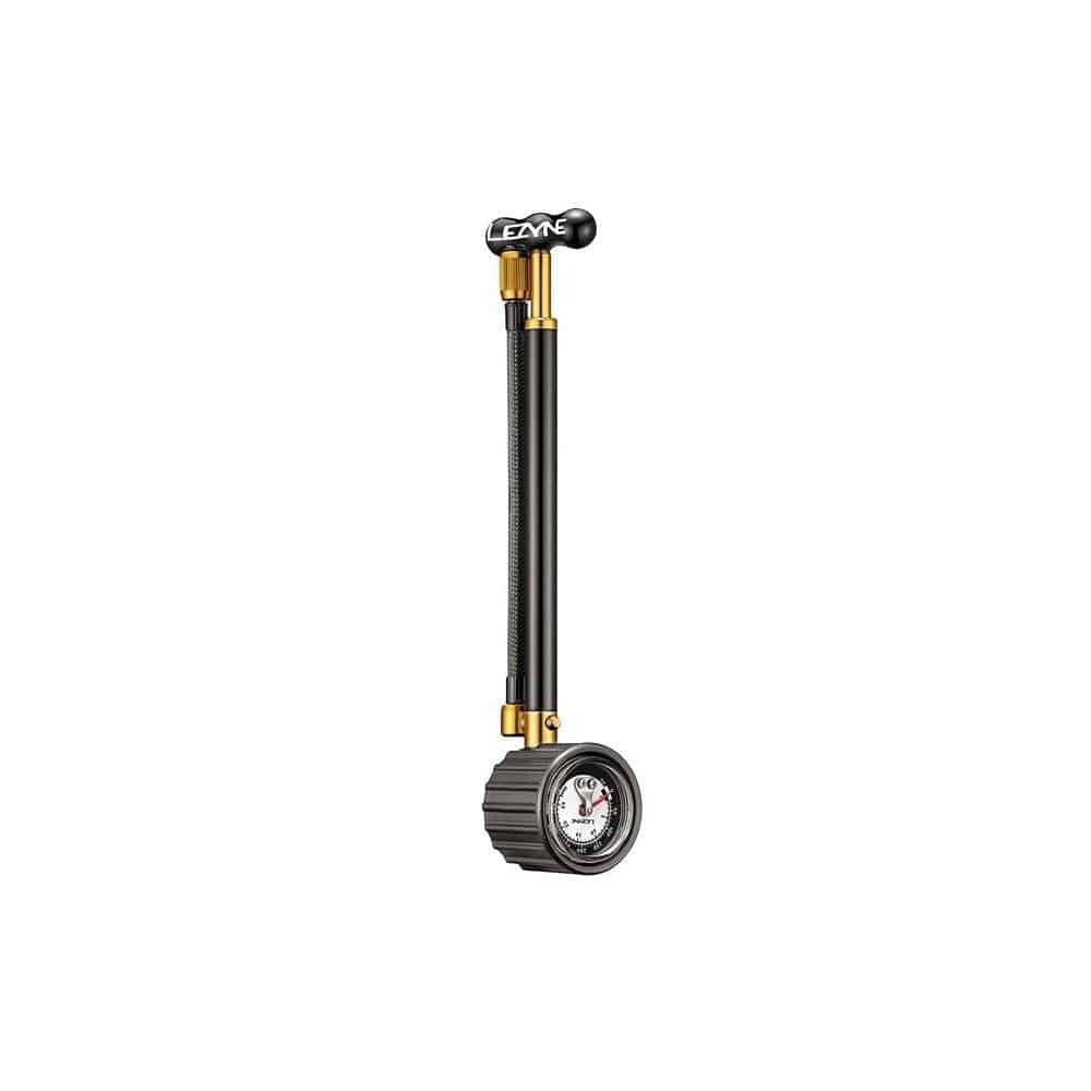 Lezyne Shock Drive portable suspension pump with pressure gauge, designed for bike shocks, showing the compact pump and manometer.