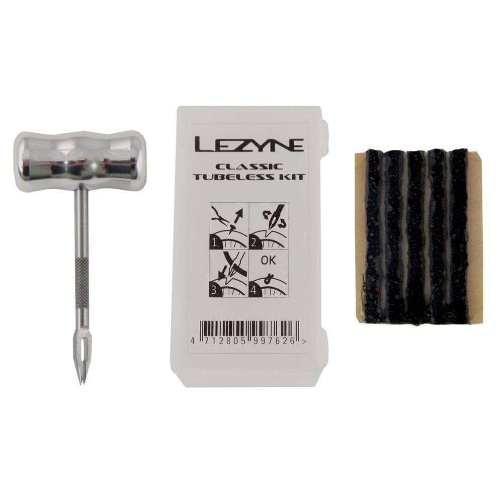 Lezyne Classic Tubeless Tire Repair Kit with aluminum tools and plugs for workshop use, featuring compact repair accessories.