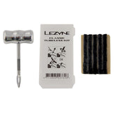 Lezyne Classic Tubeless Tire Repair Kit with aluminum tools and plugs for workshop use, featuring compact repair accessories.