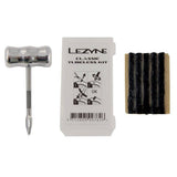 Lezyne Classic Tubeless Tire Repair Kit with aluminum tools and plugs for workshop use, featuring compact repair accessories.