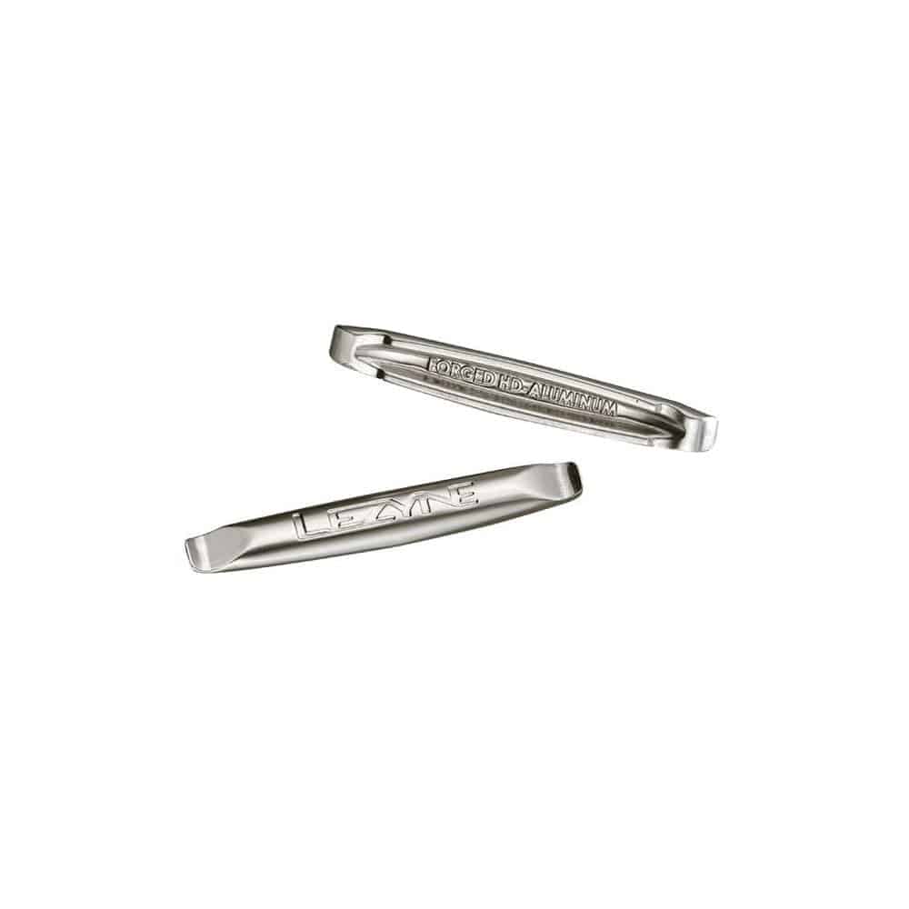 Lezyne Alloy Tyre Lever Pair for bike tire repair, showing durable, ergonomic plastic levers against a workshop background.
