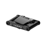 Lezyne V Pro Multi Tool for cycling, compact anti-corrosion workshop tool with various screwdrivers and wrenches on a workbench.