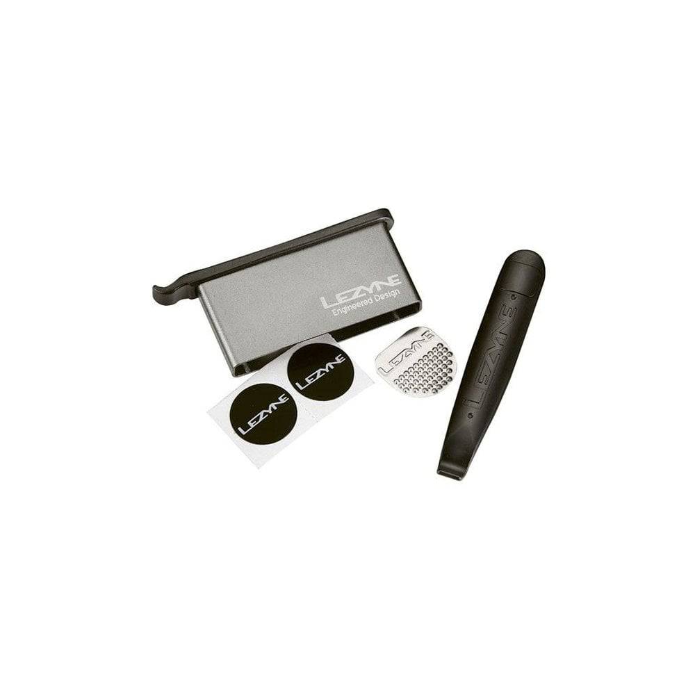 Lezyne workshop puncture repair kit for bikes with patches, levers, tyre boot, and scuffer for quick tire repairs