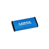 Lezyne Metal Patch Kit with waterproof aluminium case for quick tyre repairs, shown in a workshop setting.