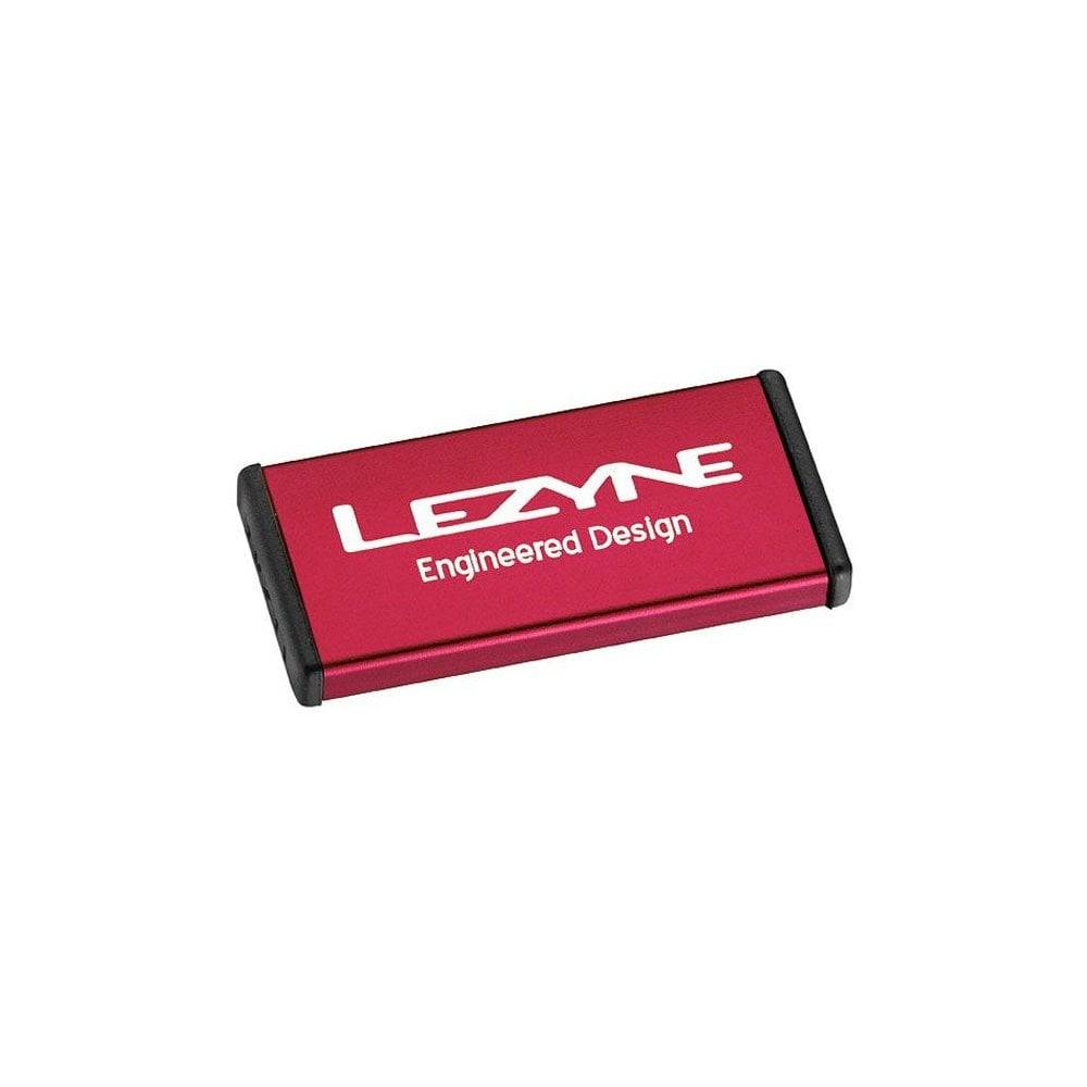 Lezyne Metal Patch Kit with waterproof aluminium case for quick bicycle tyre repairs, shown with patches and tools inside.