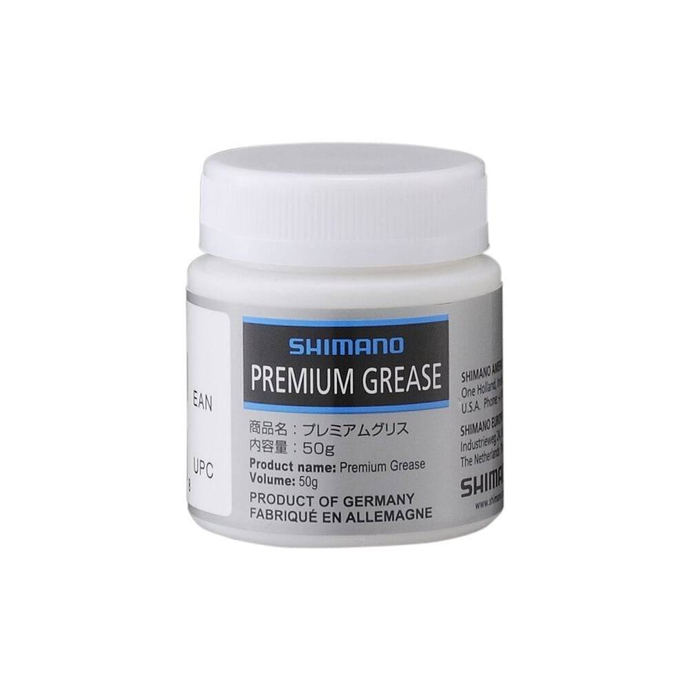 Shimano Workshop Premium Dura-Ace grease container for high-performance bike bearings, with product label visible.