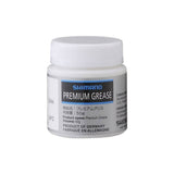 Shimano Workshop Premium Dura-Ace grease container for high-performance bike bearings, with product label visible.