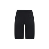 Madison Roam women's stretch cycling shorts with pockets and adjustable belt, shown in a natural pose on a model.