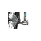 Park Tool DAG-2.2 derailleur hanger alignment gauge for precise bike derailleur adjustments in workshop setting.