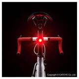 Black CatEye AMPP 100 and Orb rechargeable bike light set with USB front and rear lights for cycling safety.